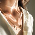 Goldkette mit Anhängern