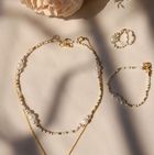 Goldset mit Perlen