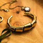 Goldarmring gemustert