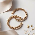 Goldohrringe mit Goldpartikeln 